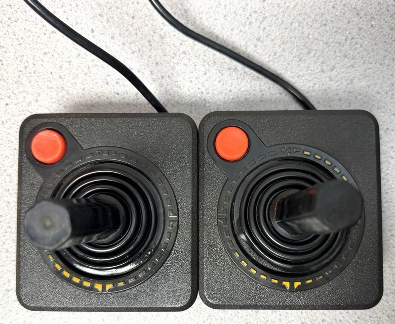 Atari 2600: 2 joysticks, OEM, clean, not tested