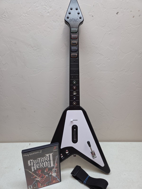 PS2 TAC Double Range Wireless Guitar W/ Guitar Hero II Game – No Dongle