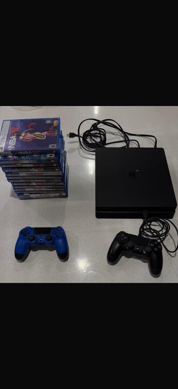 PlayStation4 w-2 DualShock Controller with charging cable and more than 10 games