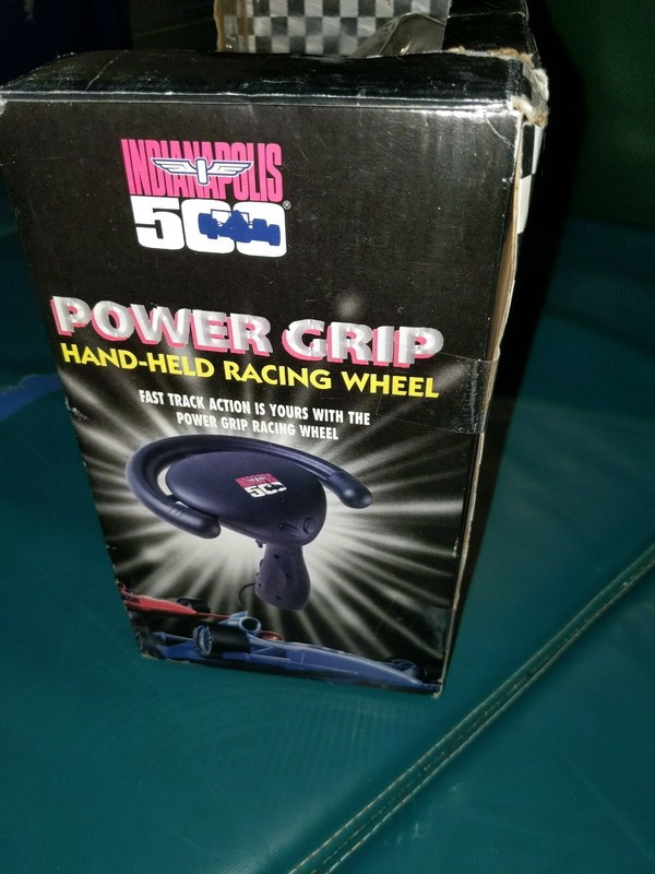 Vintage Micro innovations Indianapolis 500 Power Grip Hand Held Racing Wheel gallery