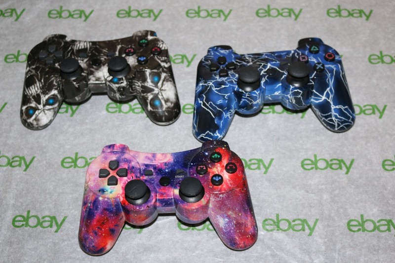 (3) video game console wireless controllers, compatible with Sony Play Station 3