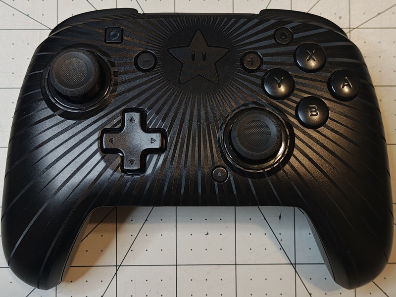 PDP Nintendo Switch Faceoff Wired Pro Controller Black Super Mario Star